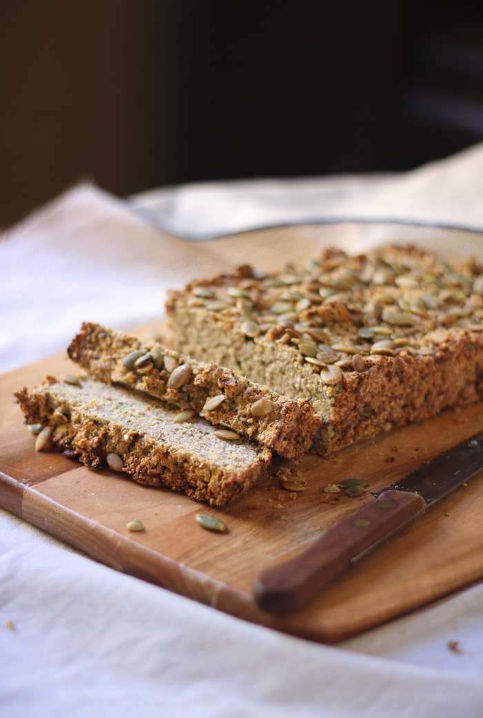 A tasty, nourishing gluten-free savoury loaf  filled with oats and quinoa and flecks of zucchini