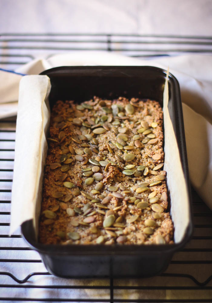 A tasty, nourishing gluten-free savoury loaf  filled with oats and quinoa and flecks of zucchini